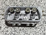 New Dual Port Cylinder Head With Sensor Hole 40X32X85.5 041101355C. Fixed Price $299.00.